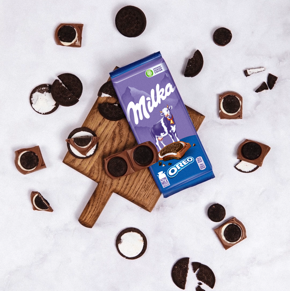 Шоколад Milka молочный с круглым печеньем Орео со вкусом ванили 92 г